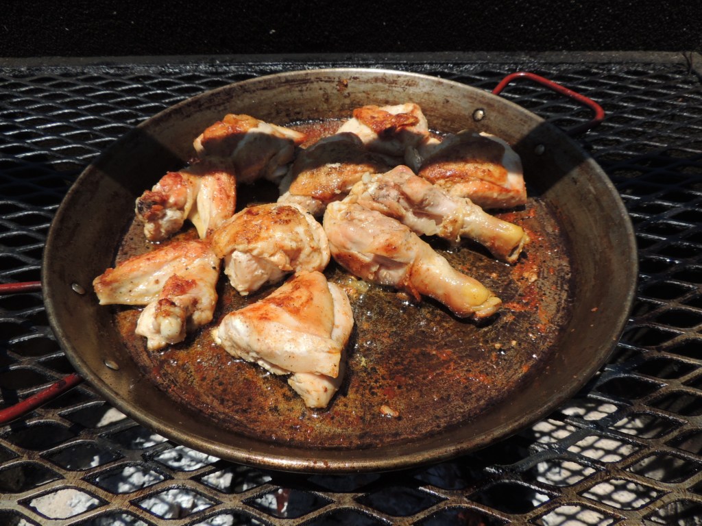 Chicken seared over a red oak fire
