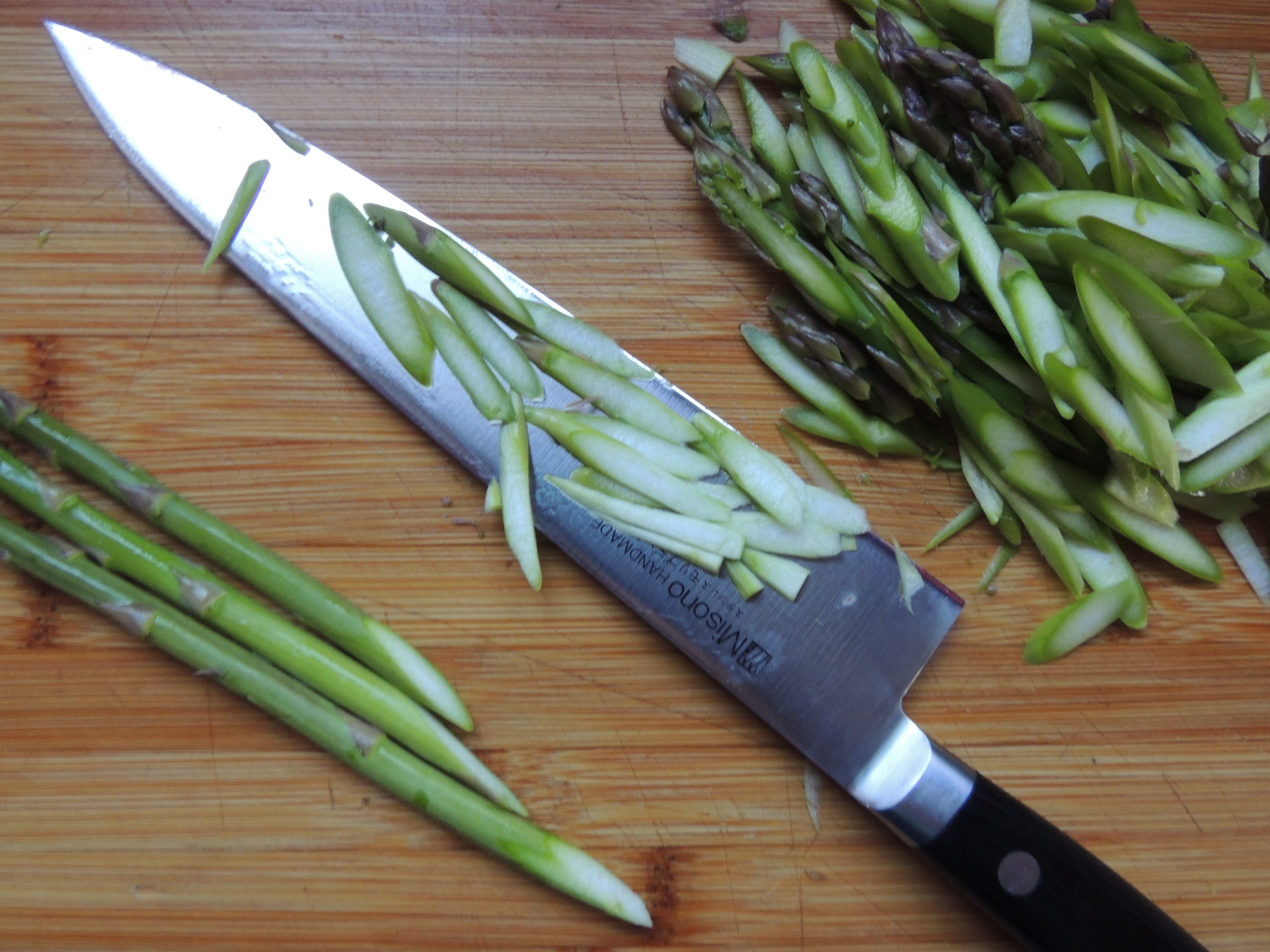 Thinly sliced asparagus