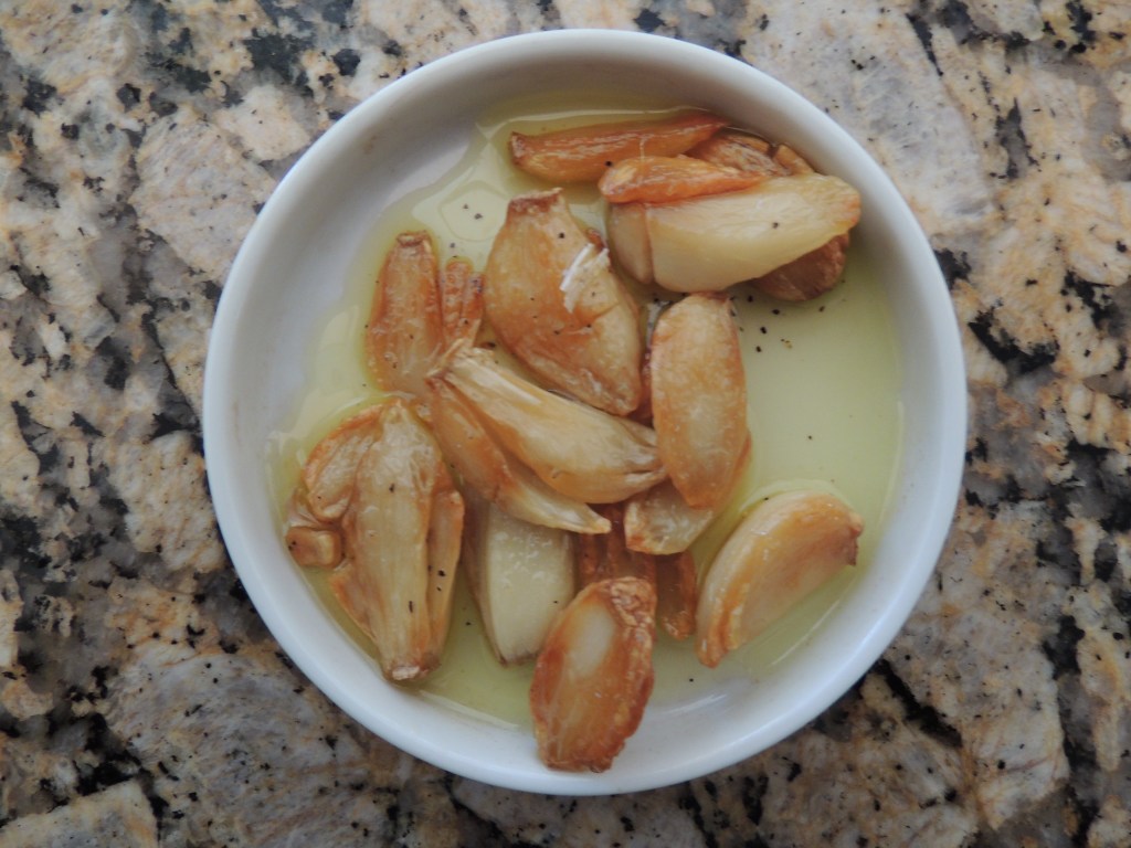 Small dish of roasted garlic